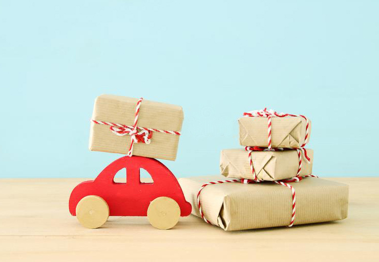 wooden-red-car-carrying-christmas-gift-wooden-red-car-carrying-christmas-gift-129451214.jpg